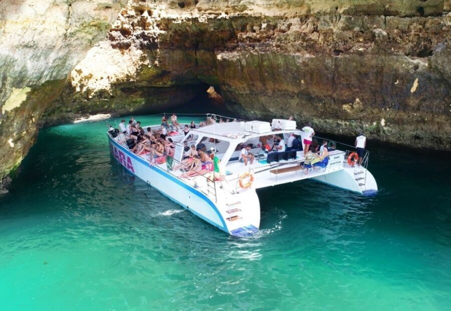 Albufeira: Catamaran Cruise with BBQ & Open Bar on the Beach - Swim time, sun time, and the end-of-day champagne toast