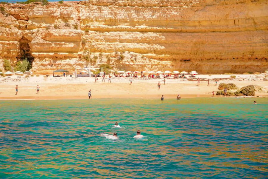 Albufeira: Sightseeing Cruise with Beach BBQ and Open Bar - The dinghy transfer and the secluded beach landing