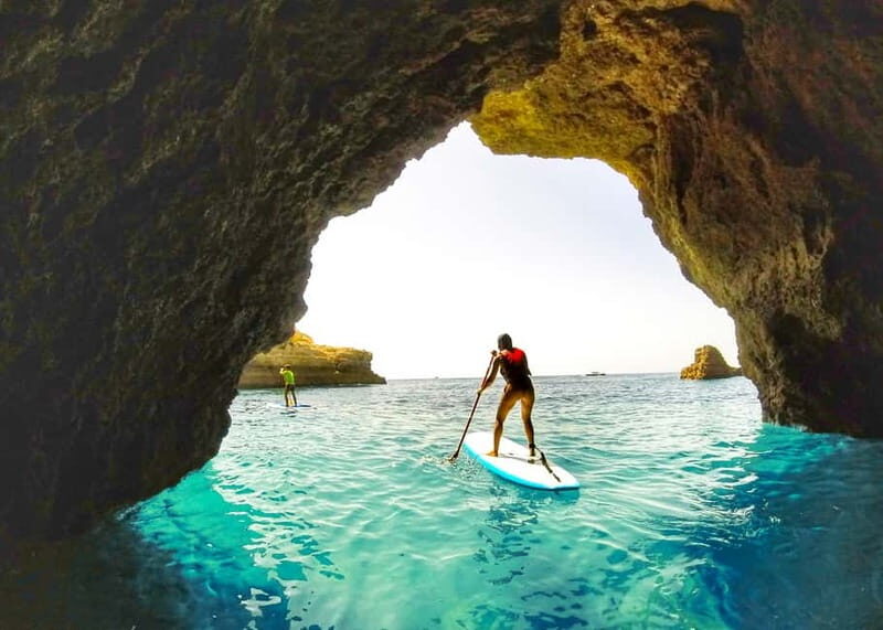 Albufeira SUP Secrets: Discover Albufeira’s Hidden Gems - Exploring Albufeira’s coastline caves, timed to the tide