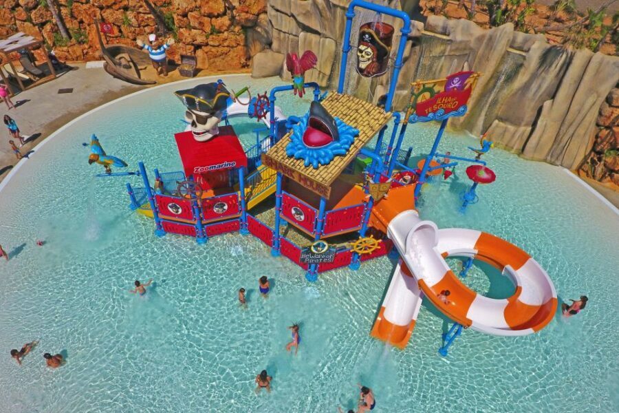 Algarve: Zoomarine Amusement Park Entry Ticket - Zoomarine Beach: wave pool, slides, sand, and aquatic play