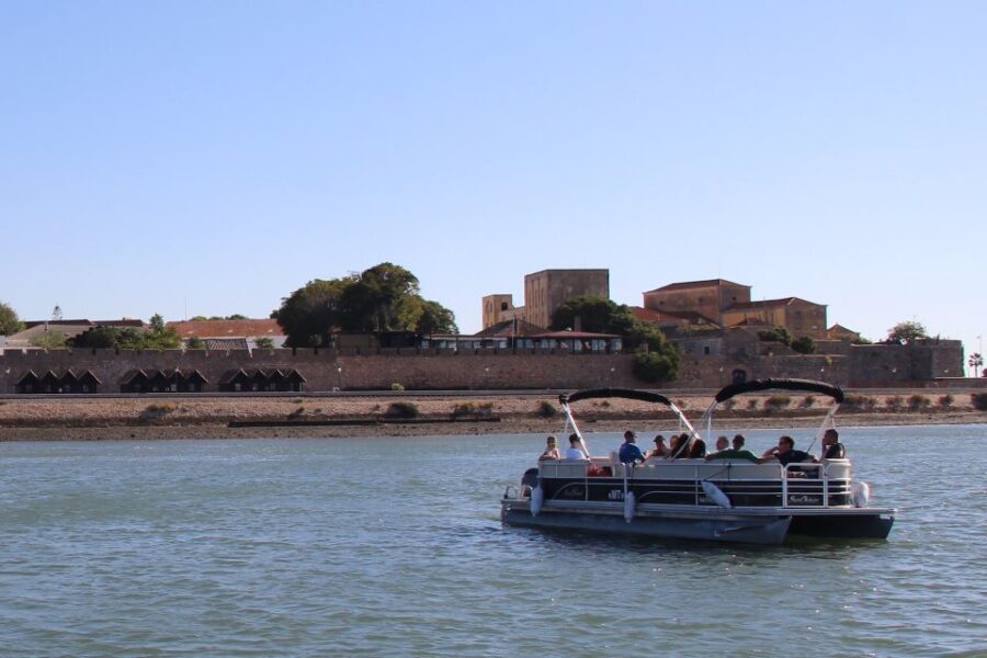 Faro: Ria Formosa Lagoon Small Boat Tour with Local Guide - Old Town Faro walls from the water: a view you can’t fake