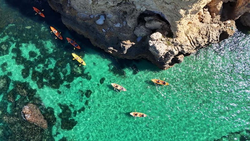 From Lagos: Ponta da Piedade Caves Kayak Tour from Catamaran - Lagos Marina catamaran ride: comfort and less paddling stress