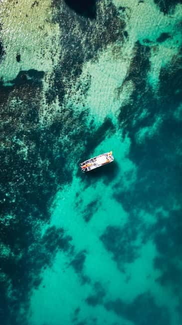 From Lagos: Ponta da Piedade Caves Kayak Tour from Catamaran - Slide from the boat into your kayak (and why it’s more than a gimmick)