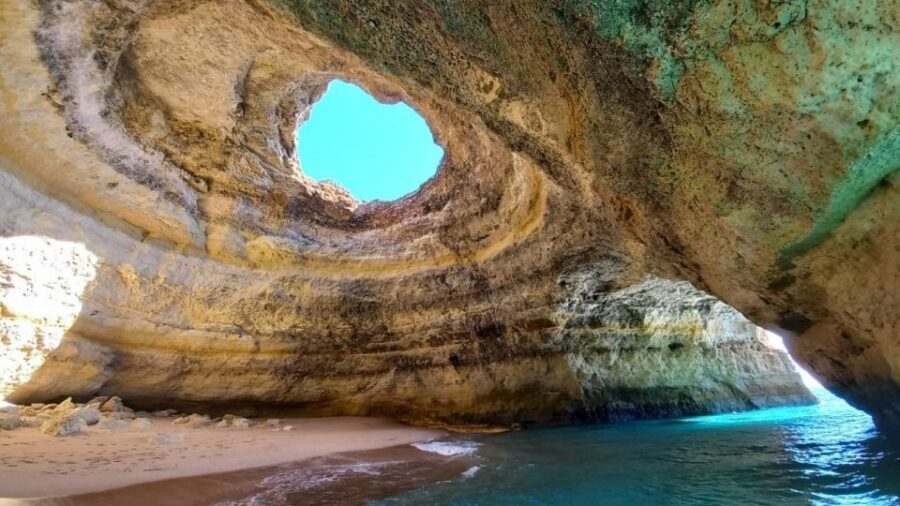 From Portimão: Algar de Benagil and Sea Caves Boat Tour - Praia da Marinha: the postcard beach stop with real photo time