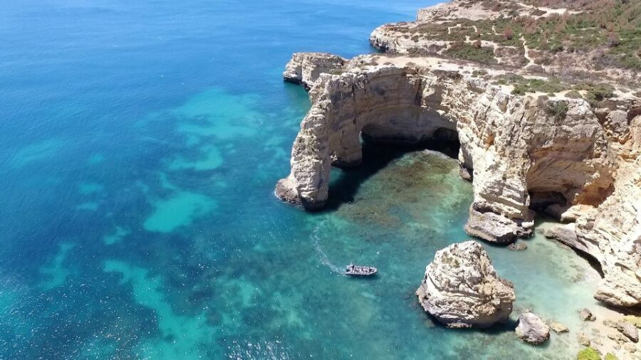 From Portimao: Benagil Cave and Marinha Beach Boat Tour - Inside Benagil Cave: getting the angles for photos