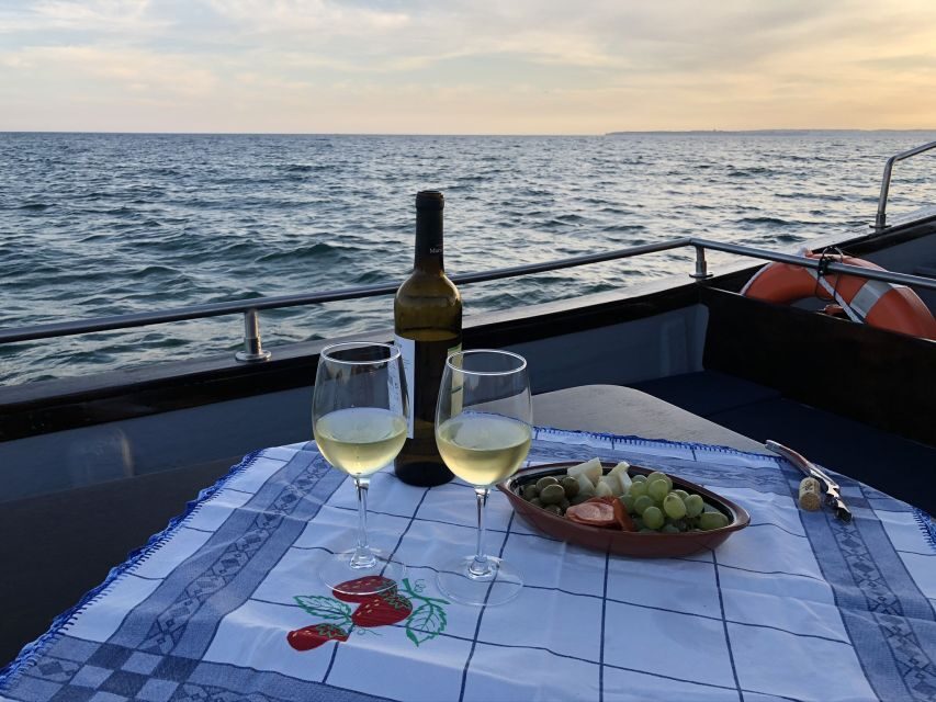 From Portimão: Sunset Boat Trip with Wine - Getting the best sunset views from the deck
