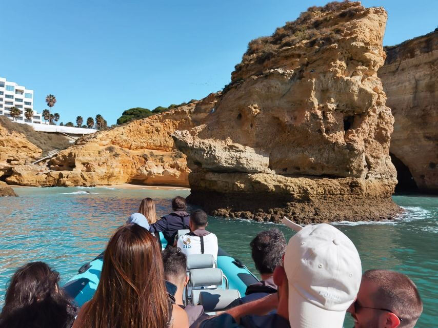 Portimão: Benagil Cave and Praia de Marinha Boat Tour - Praia da Marinha swim stop: arches, blue water, and cold reality
