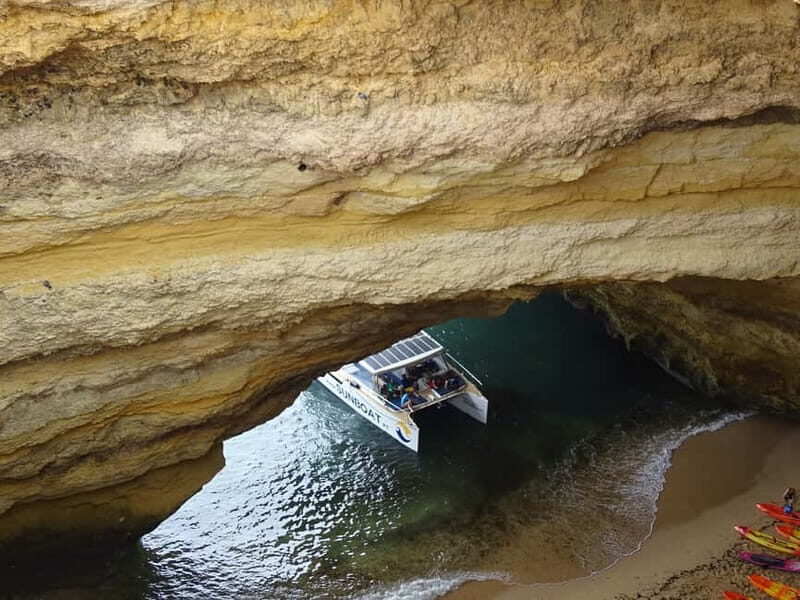 Portimão: Benagil Caves & Golden Coast Eco Catamaran Tour - The onboard experience: quiet power, shade, and a real bar