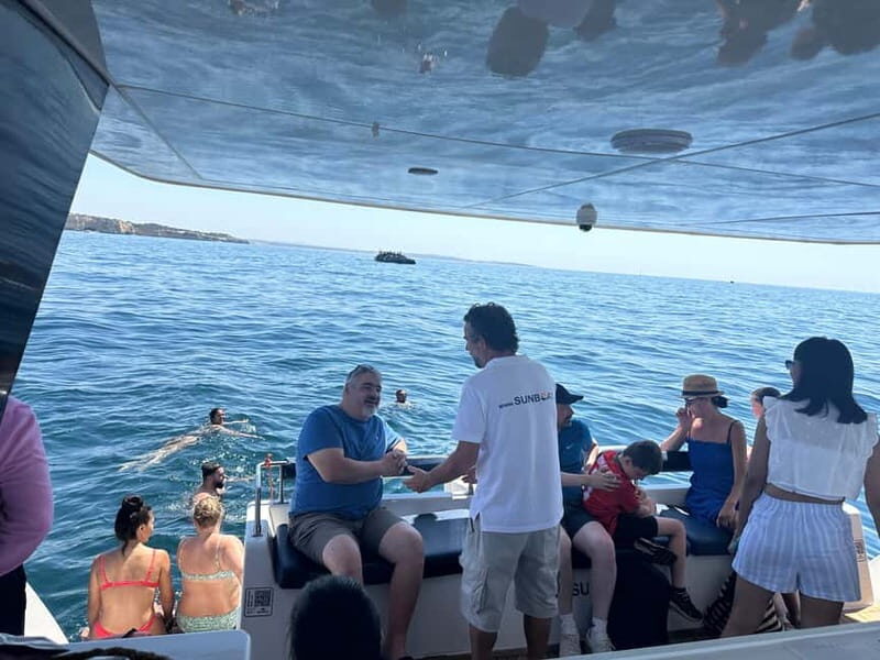 Portimão: Benagil Caves & Golden Coast Eco Catamaran Tour - Swim break rules: bring your towel in summer, skip it on sunset