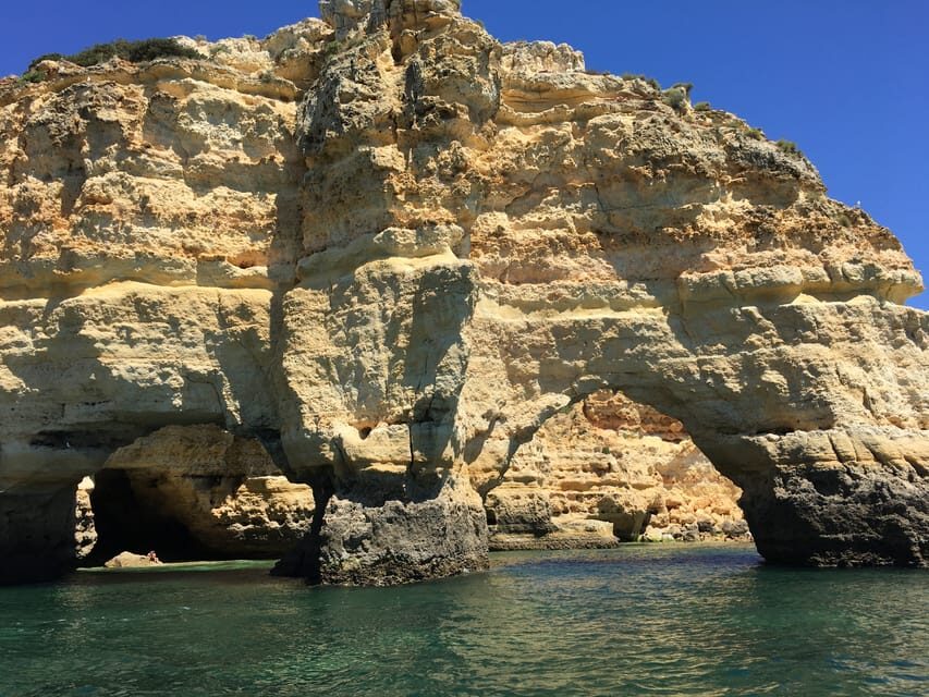 Portimão: Caves, Benagil and Algarve Coastline Boat Tour - Languages and guiding style: what clarity looks like on the water