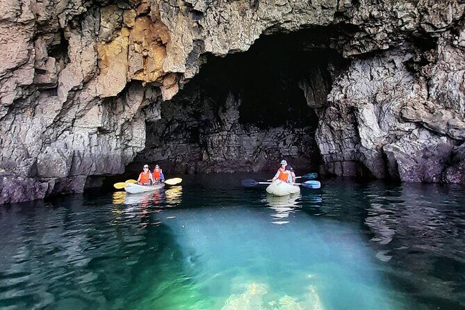 Sagres: Praia Da Ingrina Caves Guided Kayaking Tour - Stop 1: Praia da Ingrina and the Purple Cave Moments